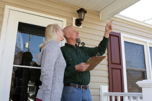 Property Appraiser looking at home